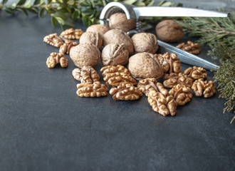 Walnuts on a black background, walnut kernels. Healthy food from walnut.