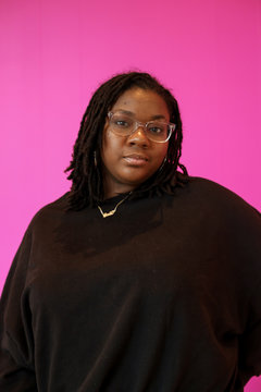 Studio portrait of woman with glasses