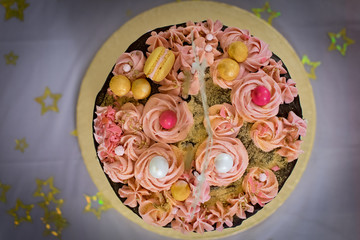 Luxury hand made cake from above. bon-bon, macarons and meringue