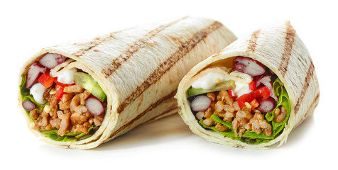 Tortilla wrap with fried minced meat and vegetables