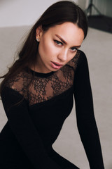 Portrait photo of a brunette.Model in the Studio doing portraits