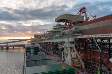 General cargo ship at grain terminal before loading operations