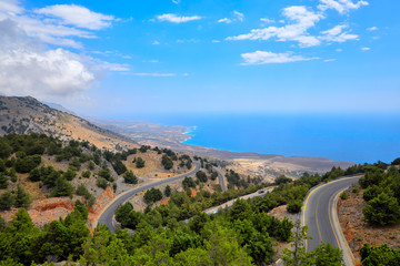 View from the hill to a costal road and coastline of Crete