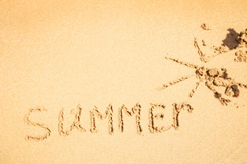 Beautiful drawing on the sand of the sea background