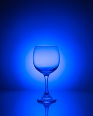 empty glass on blue 
