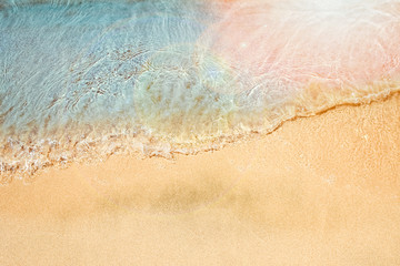 Fototapeta na wymiar Beautiful drawing on the sand of the sea background