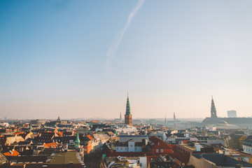 February 18, 2019. Denmark Copenhagen. Panoramic top view of the city center from a high point. Round Rundetaarn Tower