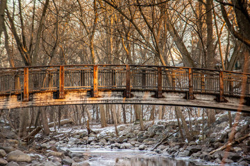Fototapeta na wymiar Bridge over a Winter Creek
