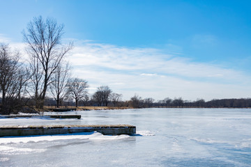 Boating Docks at Tampier Lake in Palos Township, Illinois Completely Frozen Over in Winter