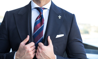 Detail of man in expensive custom tailored suit