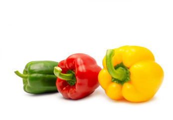 Red green and yellow sweet bell pepper on white background.(clipping path)