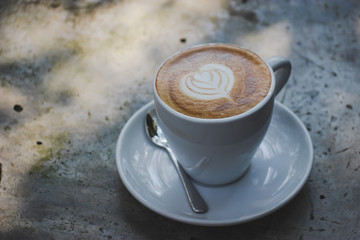 Coffee on the table in the garden