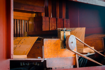 Inside mechanism of a pipe organ