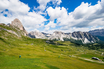 Fototapeta na wymiar Typical Italian Dolomites landscape shot with beautiful white clouds