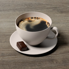 Tasse de café avec chocolat sur fond bois