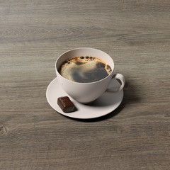 Tasse de café seule sur une table avec chocolat 