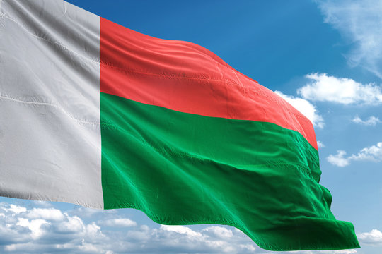 Madagascar flag waving sky background 3D illustration
