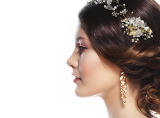 adorable young bride with gorgeous diadem in her hair