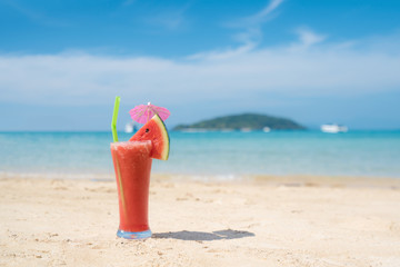 Watermelon cocktail on blue tropical summer beach in Phuket, Thailand. Summer, Vacation, Travel and...