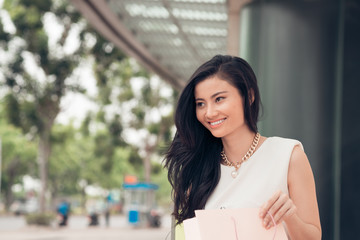 Lovely shopaholic in cafe