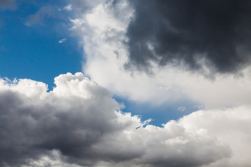 Dark clouds interspersed with white clouds