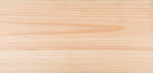 Background planed pine boards. Light bright wood texture.