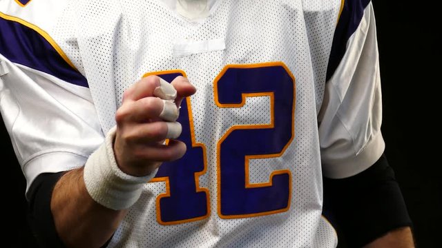 American Football Player's hands