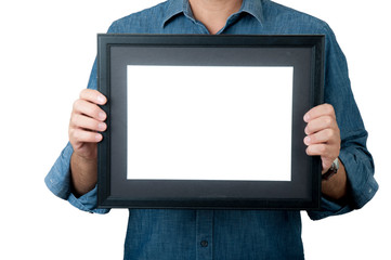 Man with blue jean shirt hold black picture frame