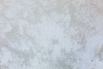 Textured putty on wall. Rough grunge wall background.