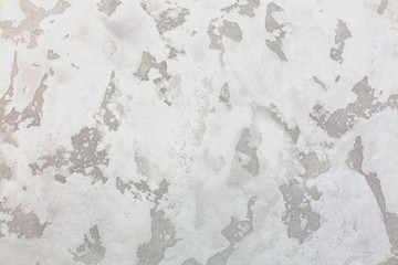 Textured putty on wall. Rough grunge wall background.