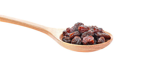 Dried raisins in spoon on white background