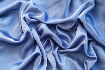 Obraz premium Fabric blue waves - material for background and texture.