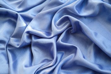 Obraz premium Fabric blue waves - material for background and texture.