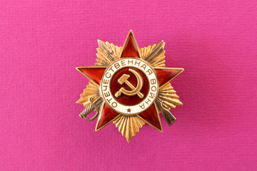 The order of the Great Patriotic war on the purple background . Filmed in Minsk, Belarus , may...
