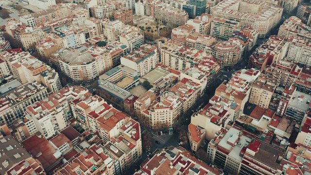 Aerial view of Barcelona city skyline with morning light, Spain. Cityscape with typical urban octagon blocks