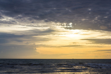 dark silhouette of cloudy sky on sunset or sunrise at tropical island in sea Thailand