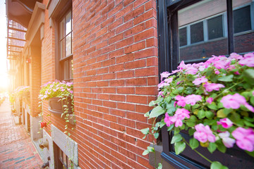 Fototapeta na wymiar Landmark Boston Beacon Hill streets and historic brick buildings