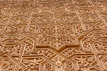 Ornate restored wall detail of Alhambra palace 