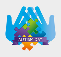 hands with puzzles and ribbon to autism day