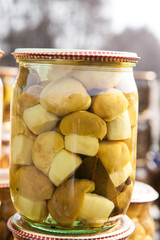 Marinated mushrooms in glass jars
