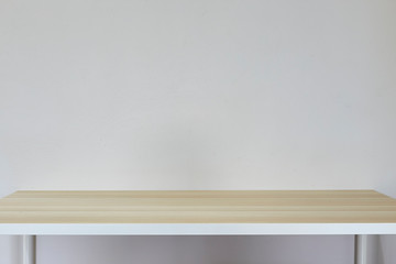 Empty light brown table in white room