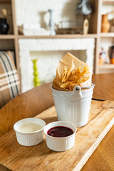 baked brushwood dessert with sauces