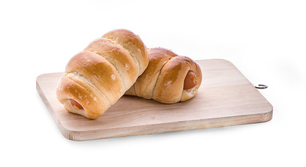 Sausage in dough .Isolated on white background