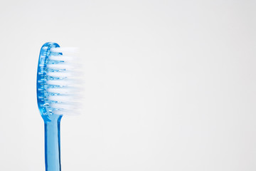 blue toothbrush isolated on white background