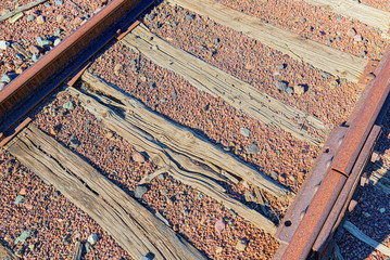 Old railway sleepers and rails in an American town.