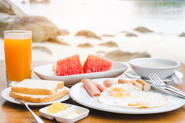 Enjoying Breakfast near tropical sea summer concept