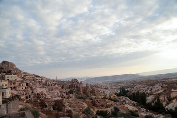 View of ancient Nevsehir cave town and a castle of Uchisar dug from a mountains in Cappadocia, Central Anatolia,Turkey 