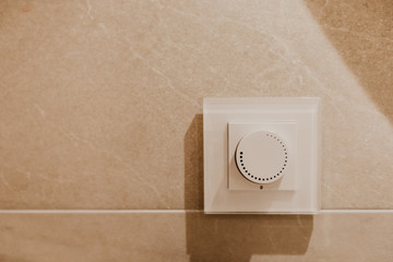 modern light switch icon on light background