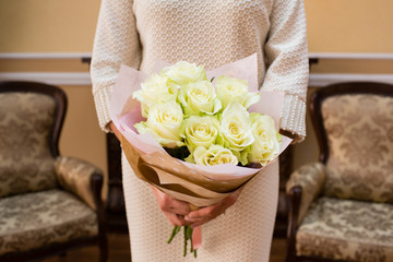 Beautiful wedding bouquet of flowers in bride’s hands