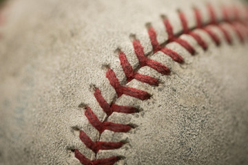 Fototapeta na wymiar Close up of baseball stitches